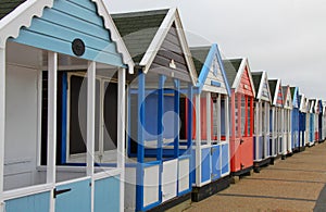 A row of coloured beach huts