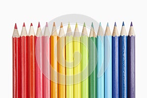 ROW OF COLOURED PENCILS SHOWING SPECTRUM COLOURS OF THE
