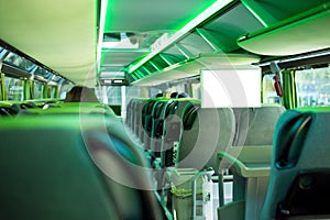 Row of comfortable seats inside a modern tourist bus