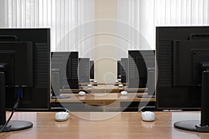 Row of computer monitors