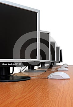 Row of computer monitors - isolated
