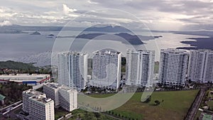 A row of condominium buildings overlooking the Taal Caldera. Highrise apartments in Tagaytay, Cavite, Philippines