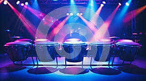 Row of Conga drums is illuminated by neon colorful stage lights. Can be used for musical event promotions or articles