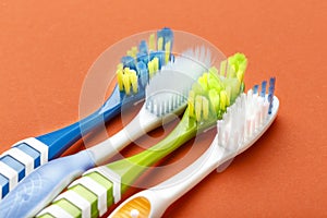 A row of different toothbrushes