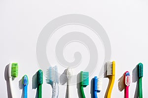 Row of different toothbrushes photo