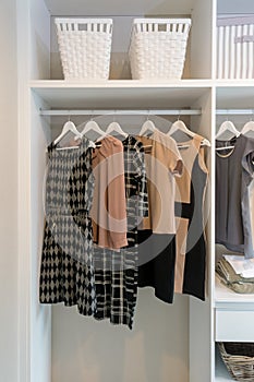 Row of dress hanging on coat hanger