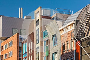 Row of Dutch contemporary canal houses in Amsterdam