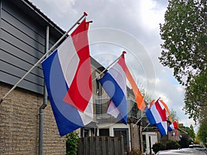 Row of Dutch flags in a street