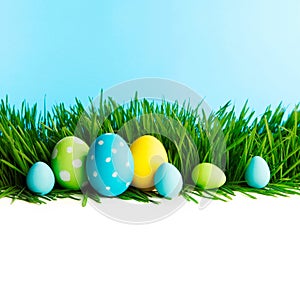 Row of Easter Eggs in grass