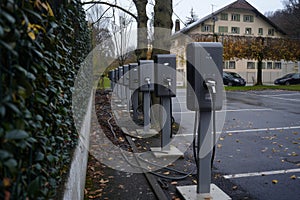 Row of electric vehicle charging stations