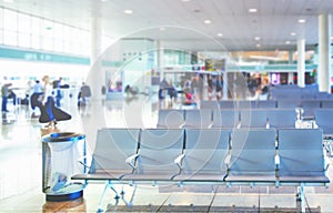 Row of empty chairs in the departure lounge of an international airport