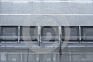 Row of empty chairs in international airport