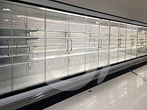 Row of empty commercial fridges