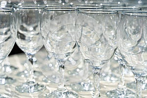 Row of empty glass wine glasses, abstract image and background