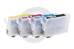 Row of empty refillable cartridges for colour inkjet printer