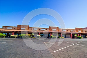 Row Of Empty Store Fronts In Commercial Building