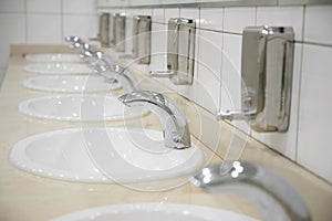 Row of faucet