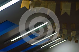 Row of fluorescent lamps of ceiling