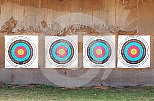 Row of four archery target rings