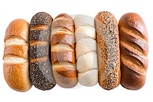Row of freshly baked bread rolls arranged on a white surface