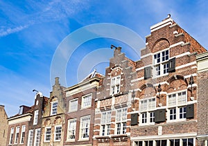 Row gable houses in Dordrecht in street Nieuwstraat and square Statenplein. The Netherlands