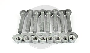 Row of galvanized steel nuts, bolts and washers