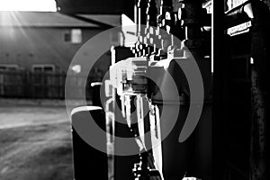 Row of gas utility meters on the outside wall of an apartment building