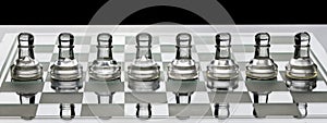 Row of glass chess pawns on a board with black and white shade