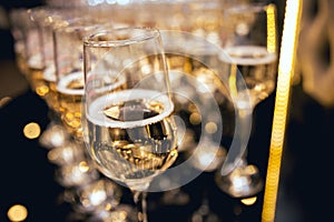 Row of glasses of wine. A restaurant.