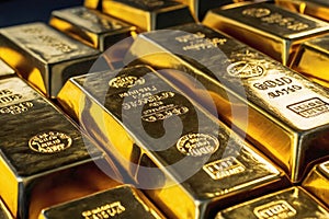 A row of gold bars. The bars are stacked