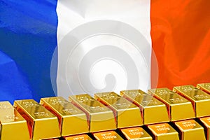 Row of gold bars on the France flag background. Concept of gold reserve and gold fund of France