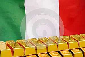 Row of gold bars on the Italy flag background. Concept of gold reserve and gold fund of Italy