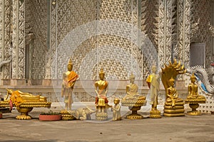 Row of golden buddha statue in Wat Mai Kham Wan temple, Phichit,Thailand.