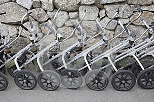 Row of golf pull carts