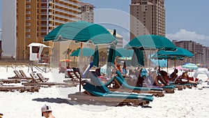 Lounge chairs and beach umbrellas