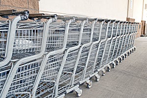 A row of Grocery shopping carts at a supermarket