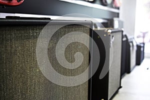 Row of guitar amplifiers. Texture copy space