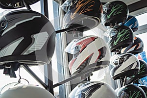 Row of helmets for go kart racing.