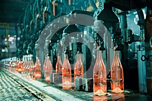 Row of hot orange glass bottles