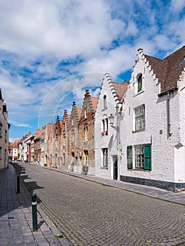 Row of houses with historic gables along Oude Gentweg in Bruges, Belgium