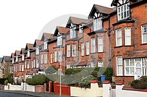 Row of houses on a street photo