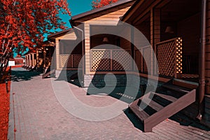 A row of identical wooden houses