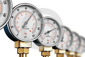 Row of industrial high pressure gas gauge meters