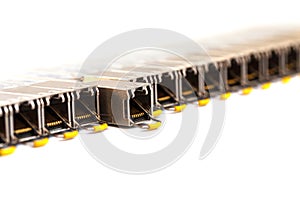 Row of Internet SFP Small Form-factor Pluggable network modules for network switch. Close up. Isolated