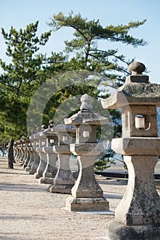 Row of Japanese stone lanterns