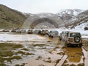 Row of jeeps in mountain