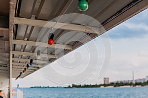 Row of light bulbs weighs on ship