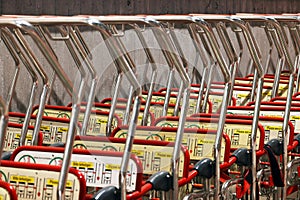 Row of luggage carts baggage cars in a station train.