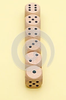 Row of many wooden dice