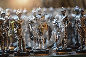 Row of metal figures of the knights for sale
